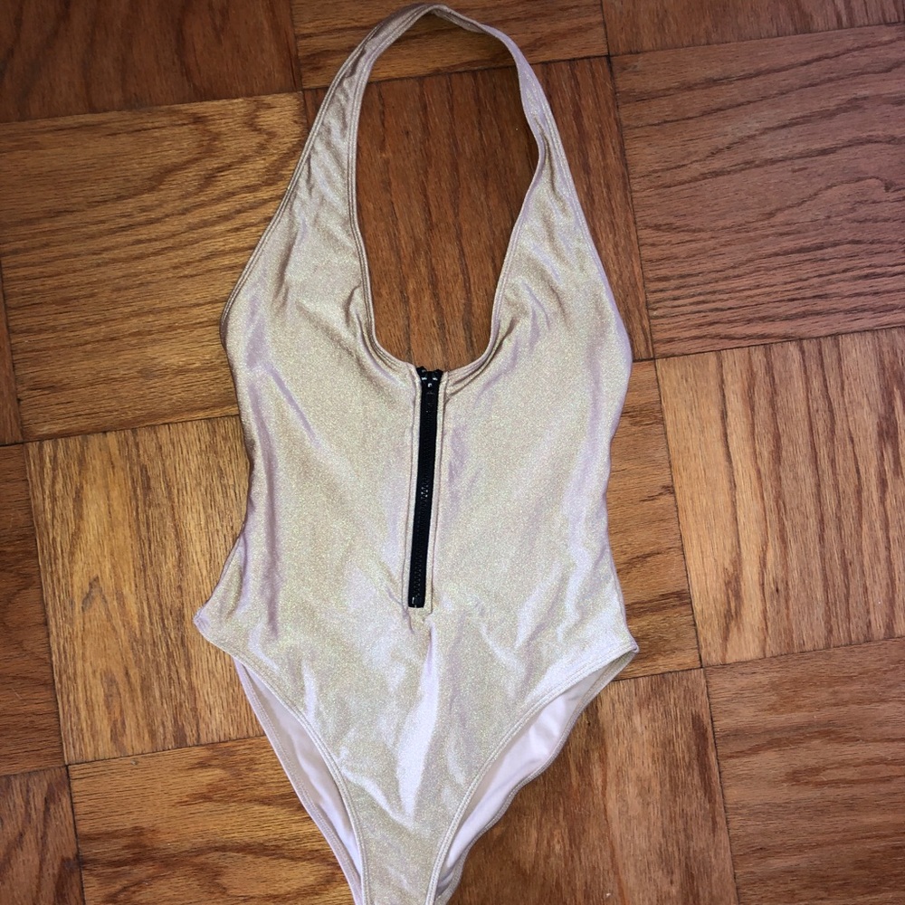 Brand new golden one piece swim suit